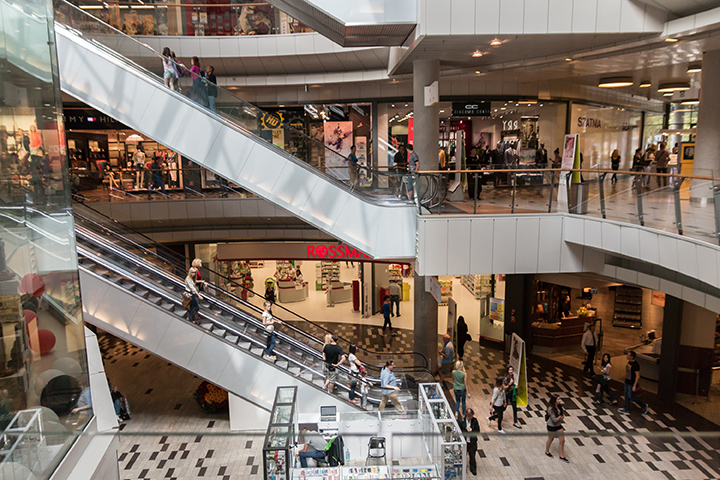 London July 2014. Westfield shopping centre. Escalator in front of